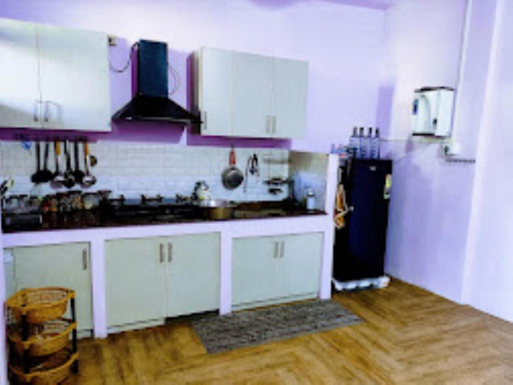 Η κουζίνα ή μικρή κουζίνα στο Chawngthu Lodge,Aizawl