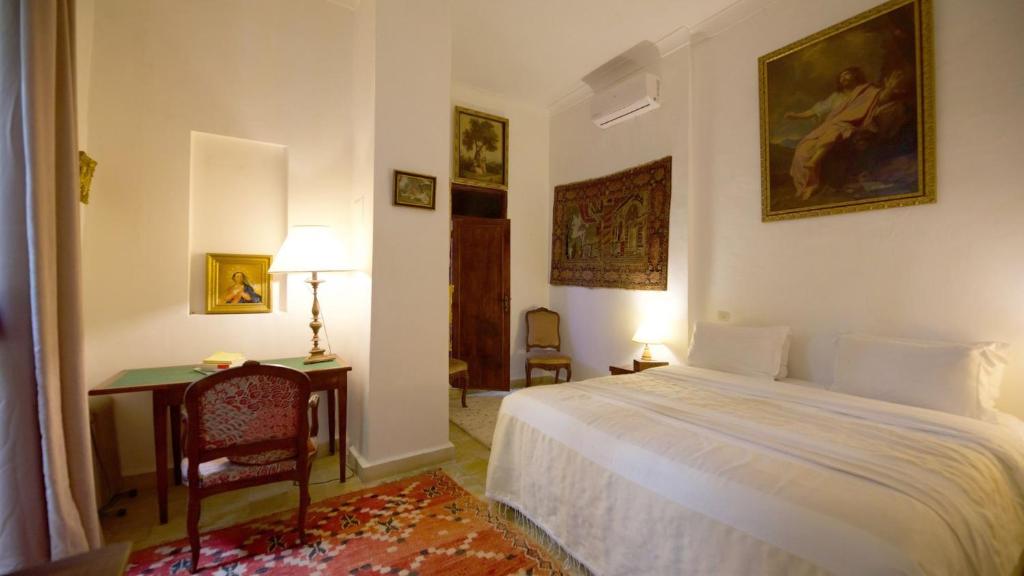Uma cama ou camas num quarto em Riad Lyla