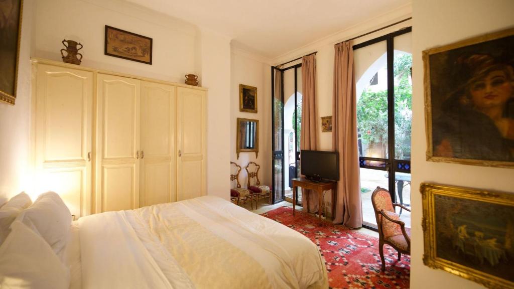 Uma cama ou camas num quarto em Riad Lyla