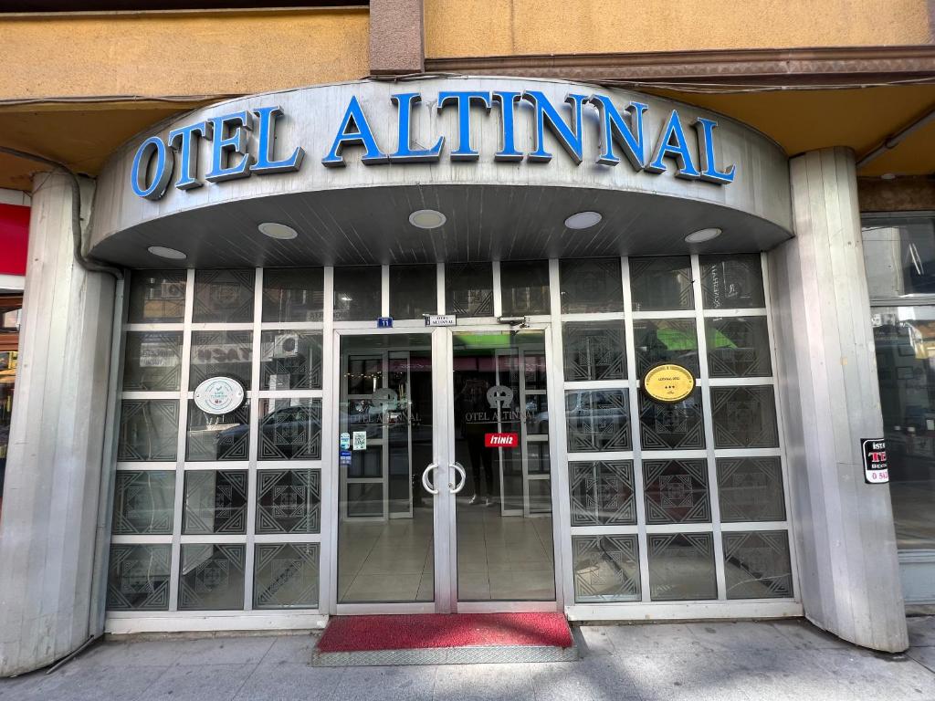 an old animal store with a sign over the door at Altinnal Hotel in Kocaeli