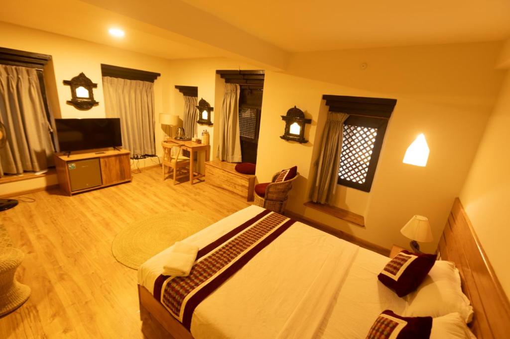 TV a/nebo společenská místnost v ubytování Subha Casa Hotel