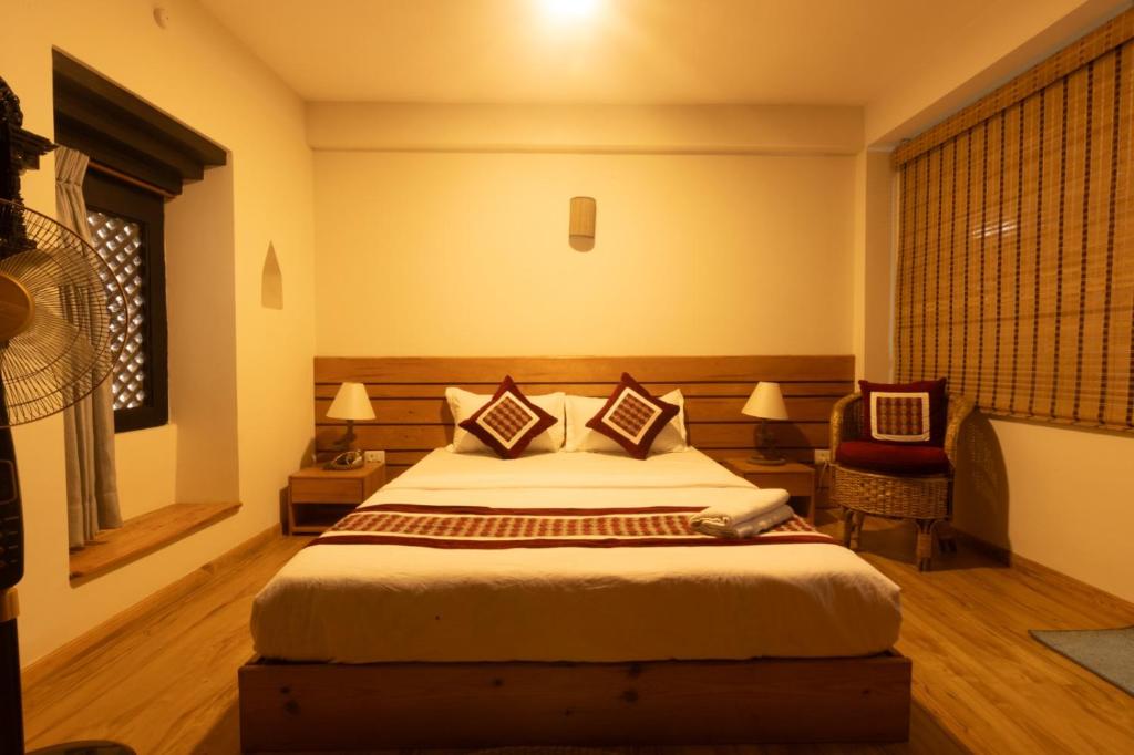 Postel nebo postele na pokoji v ubytování Subha Casa Hotel
