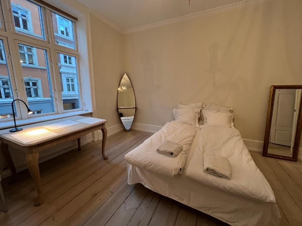 Postel nebo postele na pokoji v ubytování Historical appartment