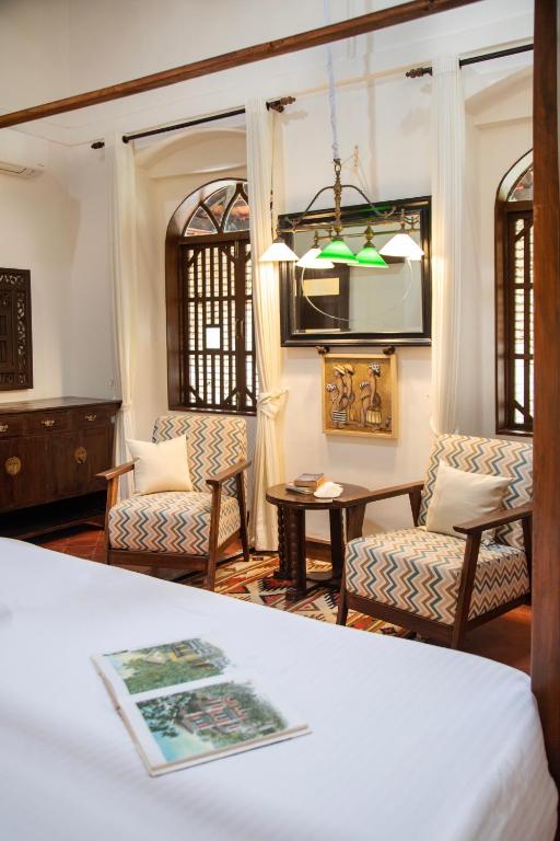 Posezení v ubytování Lamrin Ucassaim Goa An Indo Portuguese Hotel