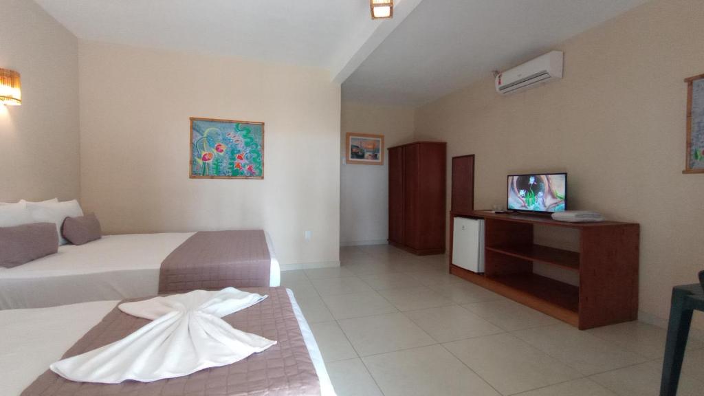 TV a/nebo společenská místnost v ubytování Hotel Coco Beach