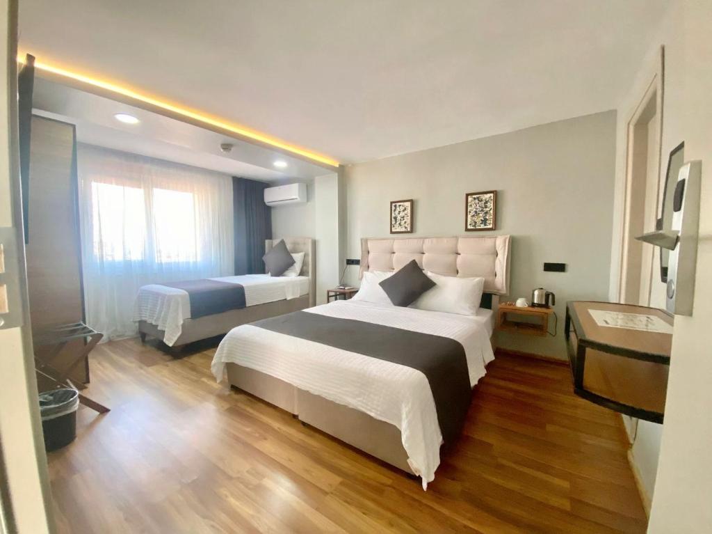 En eller flere senge i et værelse på sahar sultan hotel