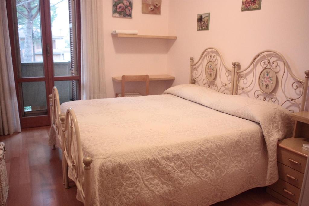 Postel nebo postele na pokoji v ubytování B&B I Narcisi