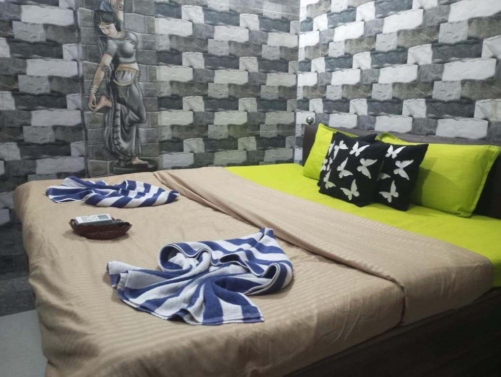 Postel nebo postele na pokoji v ubytování Baga F Leisure Stay Guest House