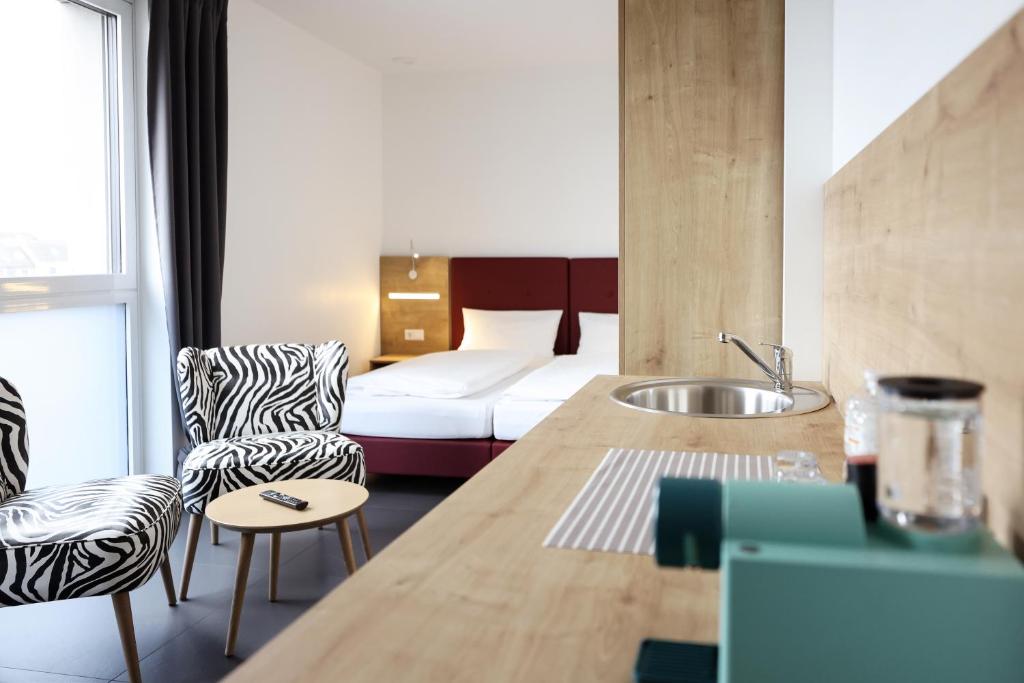 Postel nebo postele na pokoji v ubytování Hotel No151