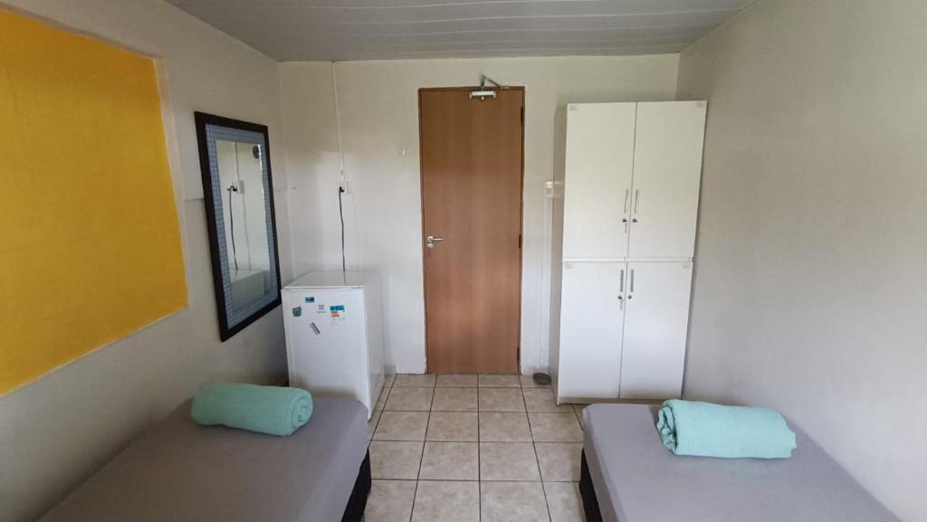 Postel nebo postele na pokoji v ubytování Ilha Hostel
