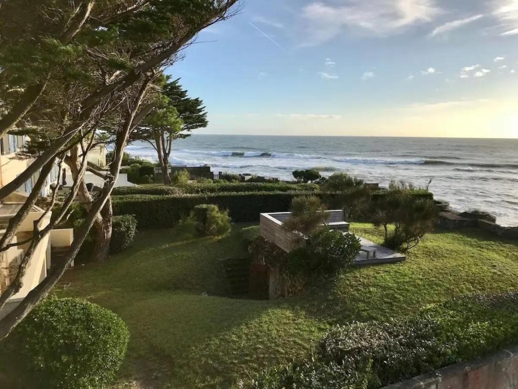 a view of the ocean from the balcony of a house at Maison de maître Baie de la Baule-9 in Pornichet