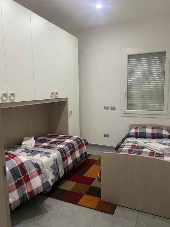 Postel nebo postele na pokoji v ubytování Casa engy