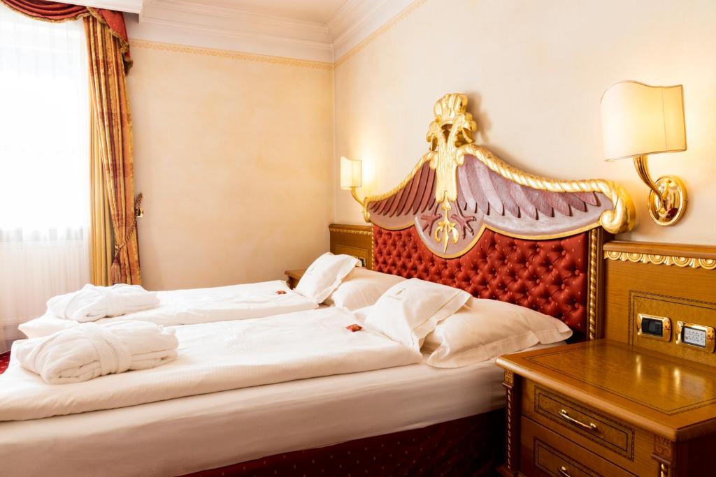 Postel nebo postele na pokoji v ubytování Cityhotel Goldener Adler B&B