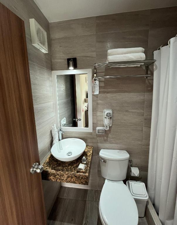 Koupelna v ubytování Rado Hotel - Quintanas