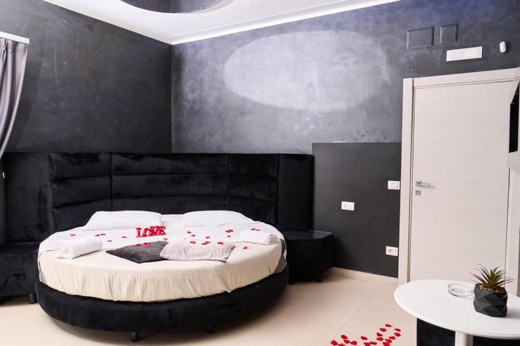 Postel nebo postele na pokoji v ubytování Hotel Melydà