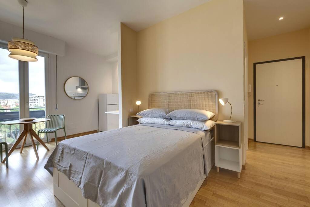 Ένα ή περισσότερα κρεβάτια σε δωμάτιο στο Florence Holiday Homes Casa Belfiore