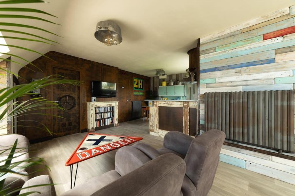 Khu vực ghế ngồi tại Couleurs Passées studio de charme