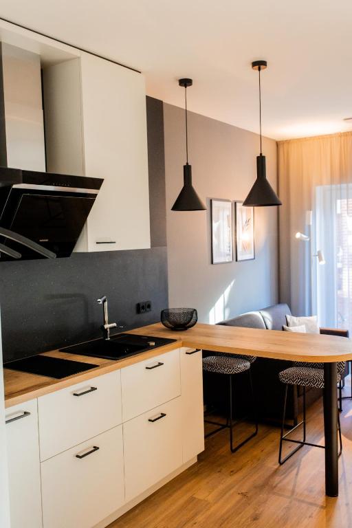 Kuchyň nebo kuchyňský kout v ubytování Boardinghouse Hense