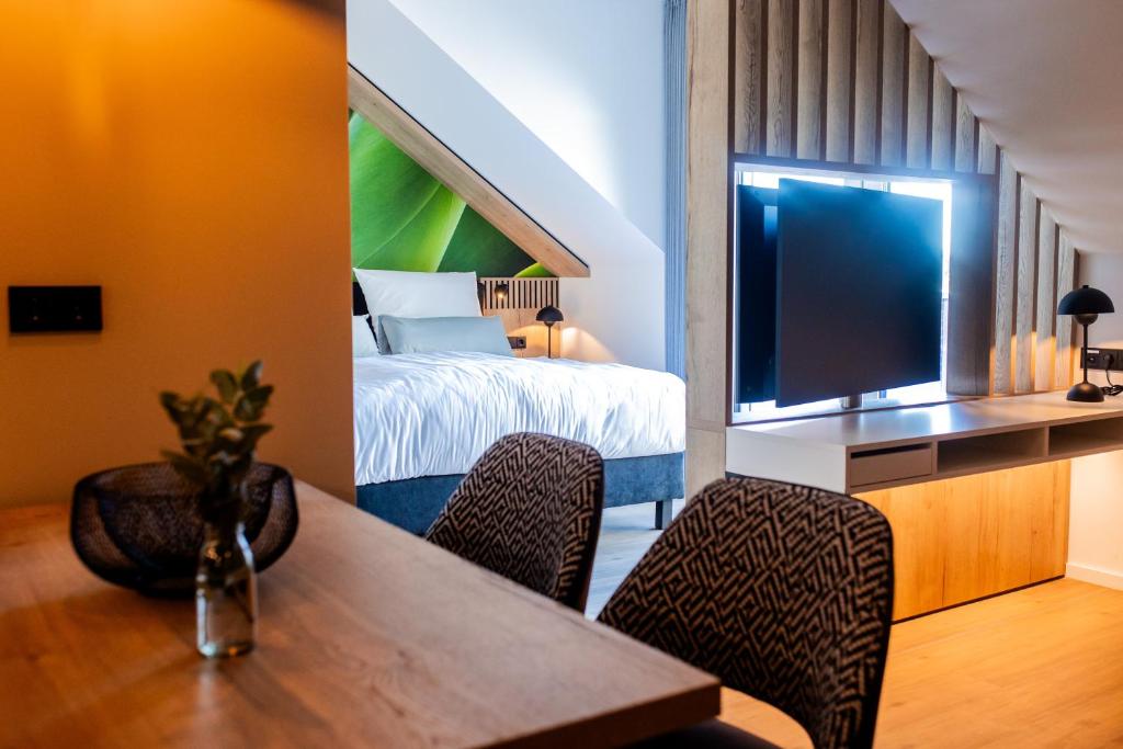 TV a/nebo společenská místnost v ubytování Boardinghouse Hense