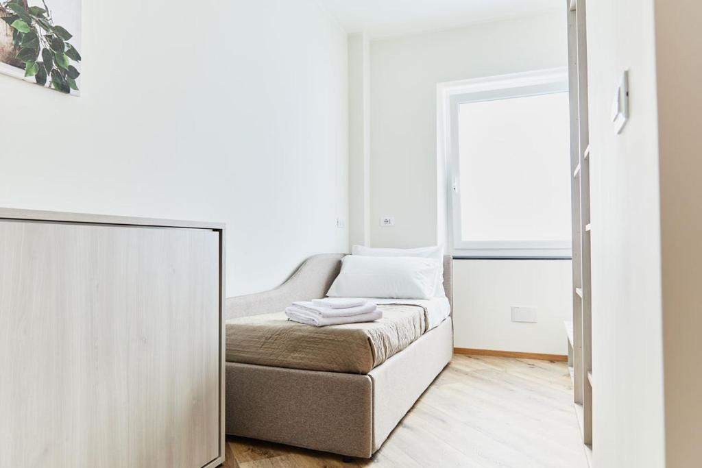 Postel nebo postele na pokoji v ubytování Affittacamere Il Faggio