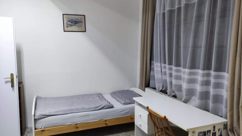 Postel nebo postele na pokoji v ubytování Nároďák Jaroměř ,UBYTOVÁNÍ