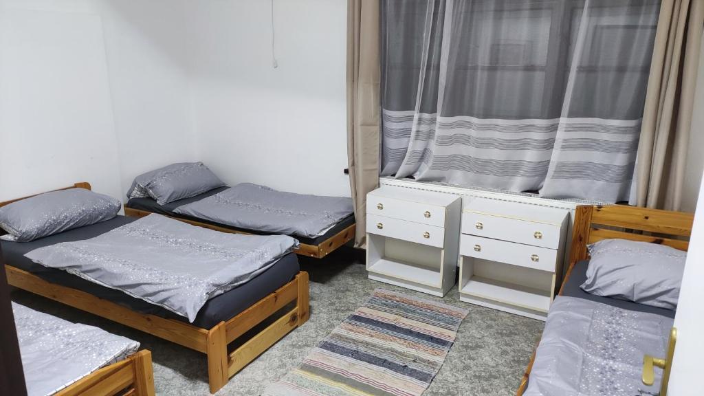 Postel nebo postele na pokoji v ubytování Nároďák Jaroměř ,UBYTOVÁNÍ