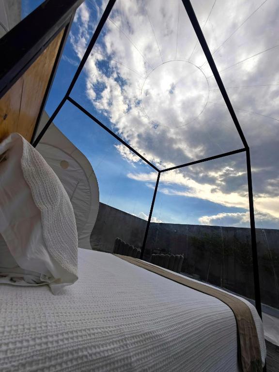 Postel nebo postele na pokoji v ubytování Hotel Wanderlive