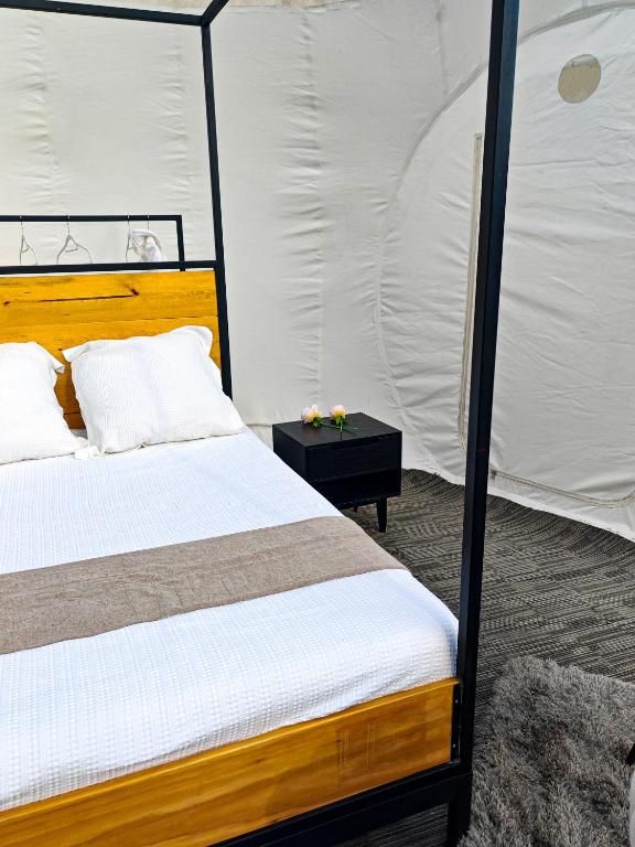Postel nebo postele na pokoji v ubytování Hotel Wanderlive