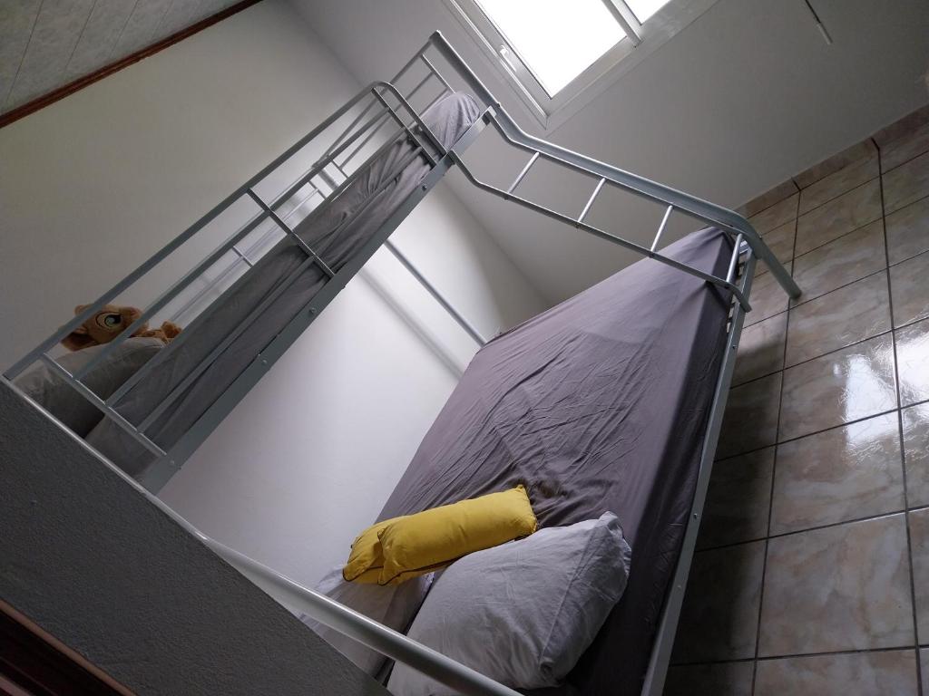 Postel nebo postele na pokoji v ubytování Ti kaz anturium