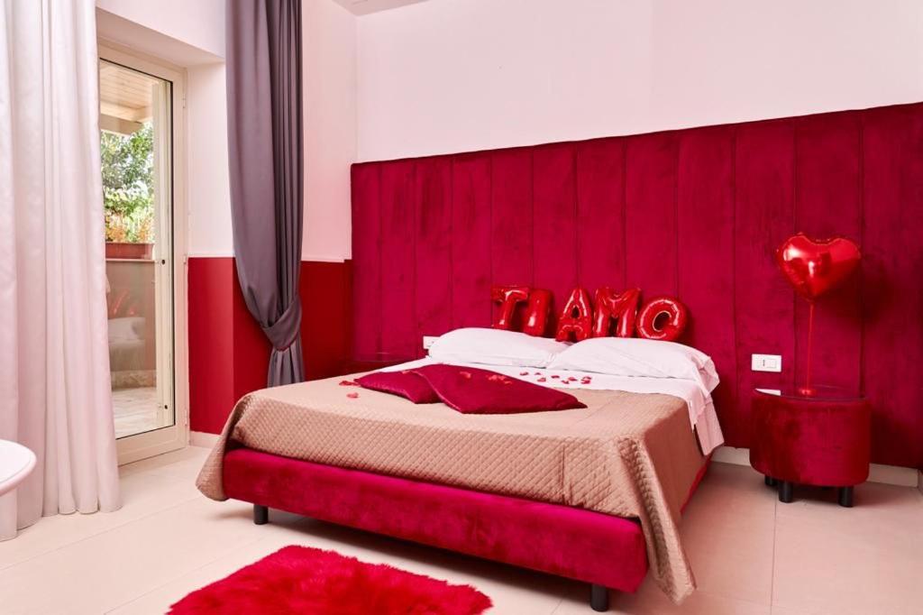 Postel nebo postele na pokoji v ubytování Hotel Melydà