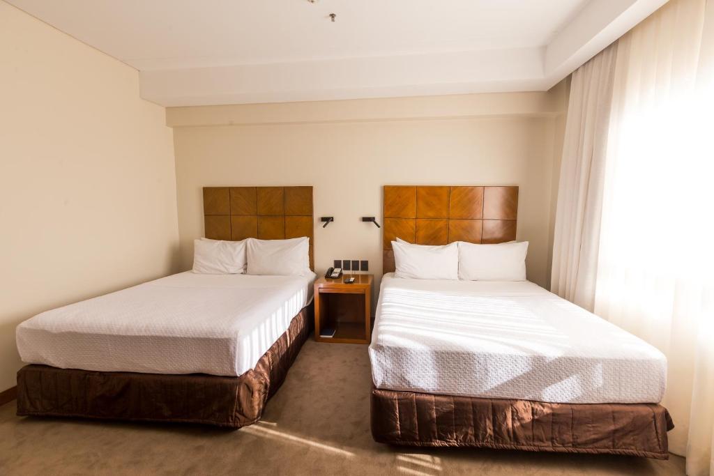 Postel nebo postele na pokoji v ubytování Crowne Plaza Asunción by IHG