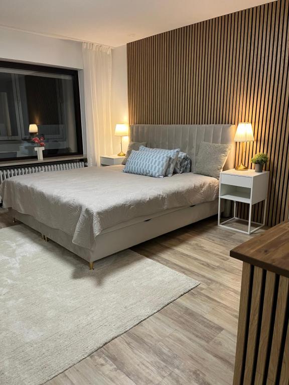 Кровать или кровати в номере Isaak Appartment Burgnähe