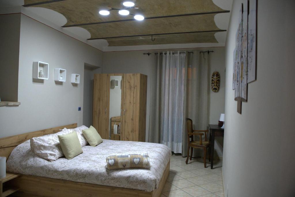 Postel nebo postele na pokoji v ubytování Tra Langhe e Monviso