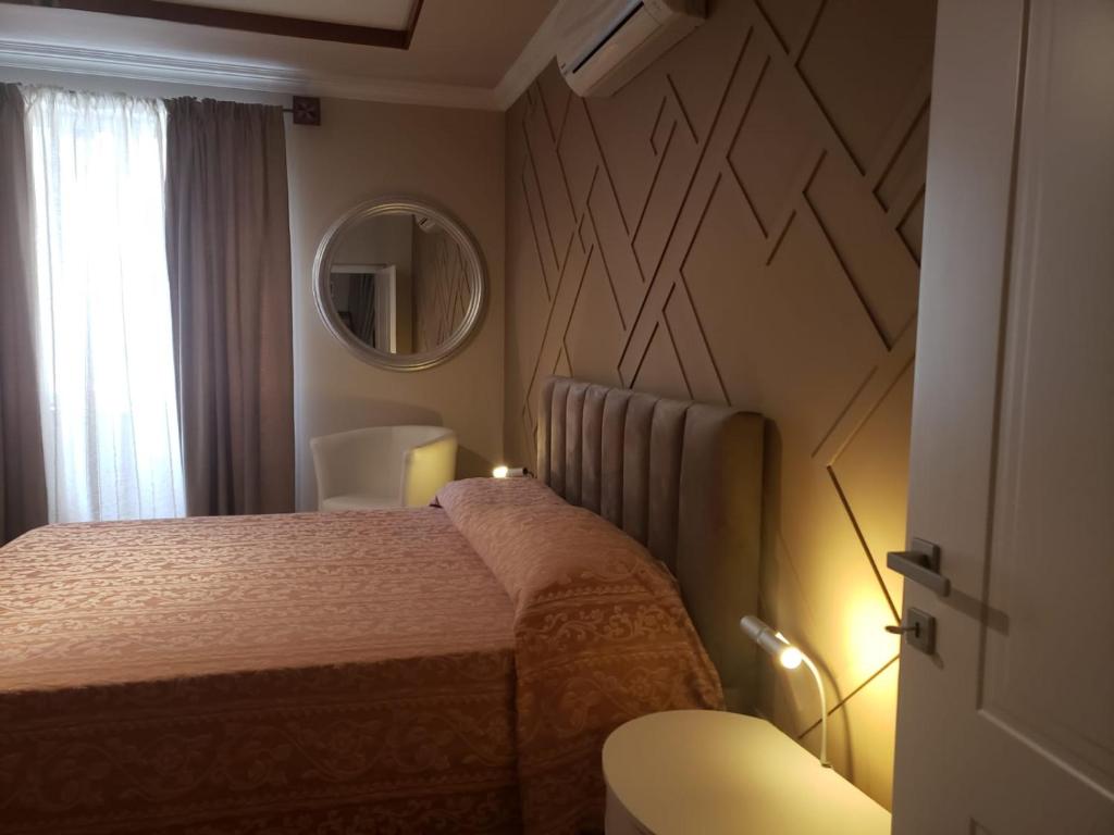 Postel nebo postele na pokoji v ubytování Art Gallery Apartments Tirana 1