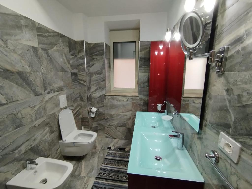 Koupelna v ubytování Art Gallery Apartments Tirana 1