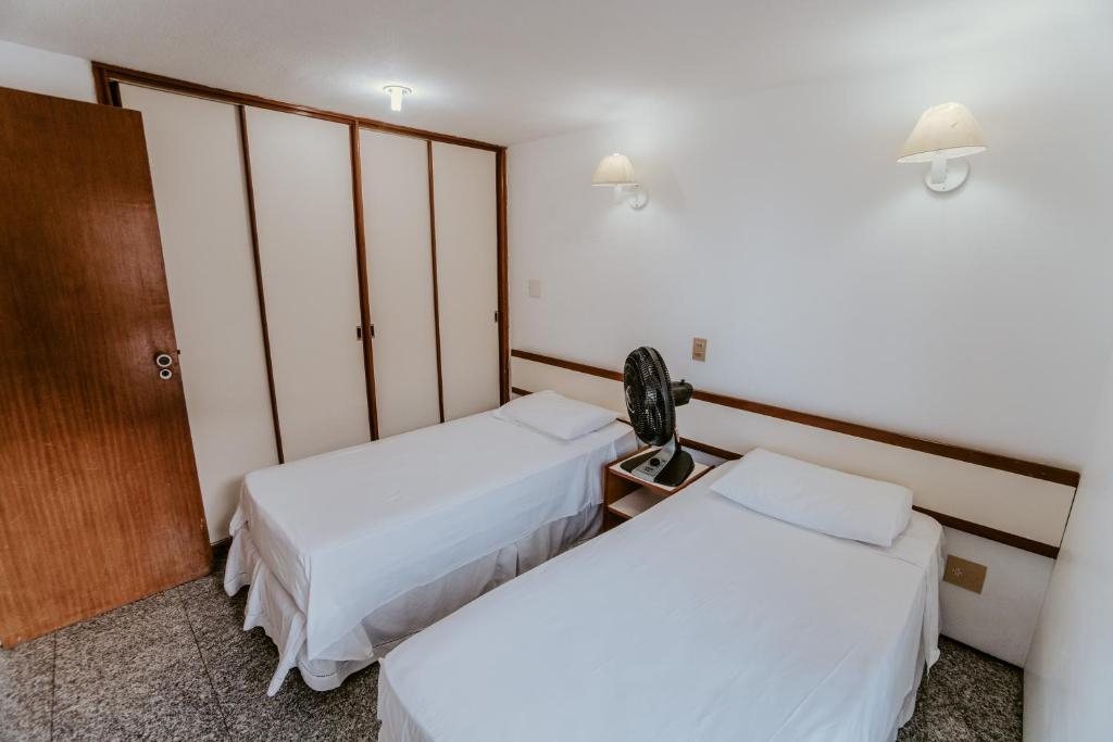 Voodi või voodid majutusasutuse Iracema Residence Hotel Flat toas