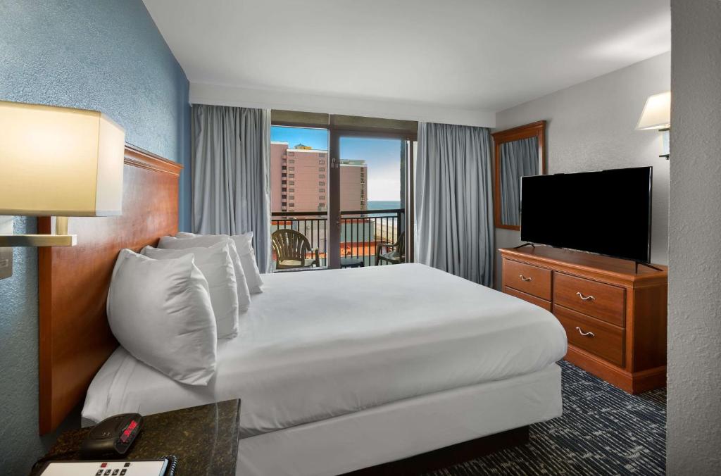 Een TV en/of entertainmentcenter bij Dayton House Resort - BW Signature Collection
