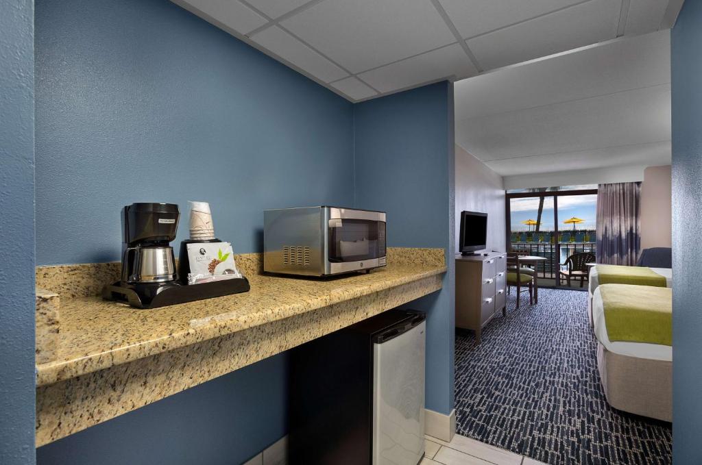 Een TV en/of entertainmentcenter bij Dayton House Resort - BW Signature Collection
