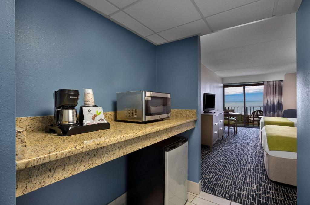 Een TV en/of entertainmentcenter bij Dayton House Resort - BW Signature Collection
