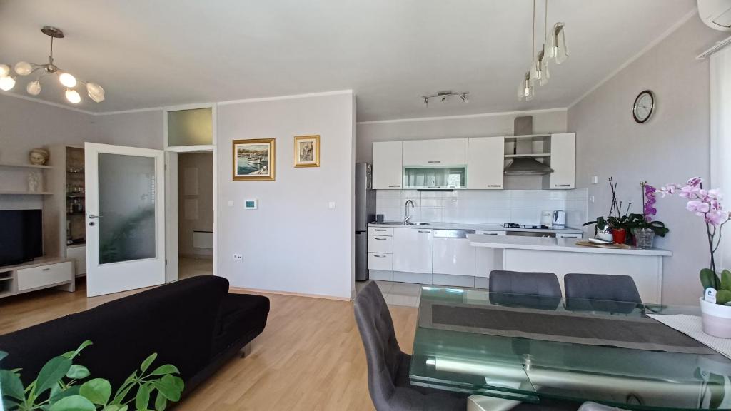Kuchyň nebo kuchyňský kout v ubytování Apartments 255