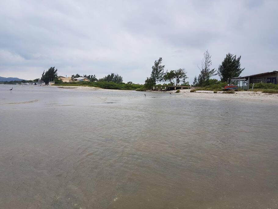 Um lugar para relaxar في باليوسا: تجمع المياه بالشاطئ والبيوت