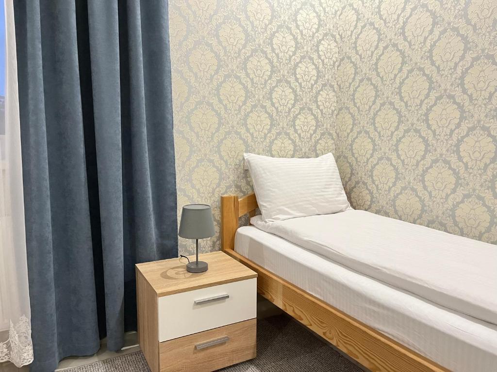 Postel nebo postele na pokoji v ubytování Park Hotel
