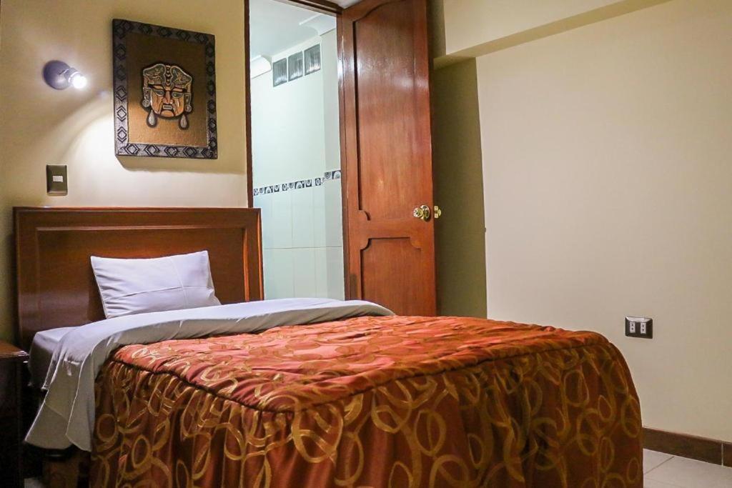 Postel nebo postele na pokoji v ubytování Hotel Elmer-Z