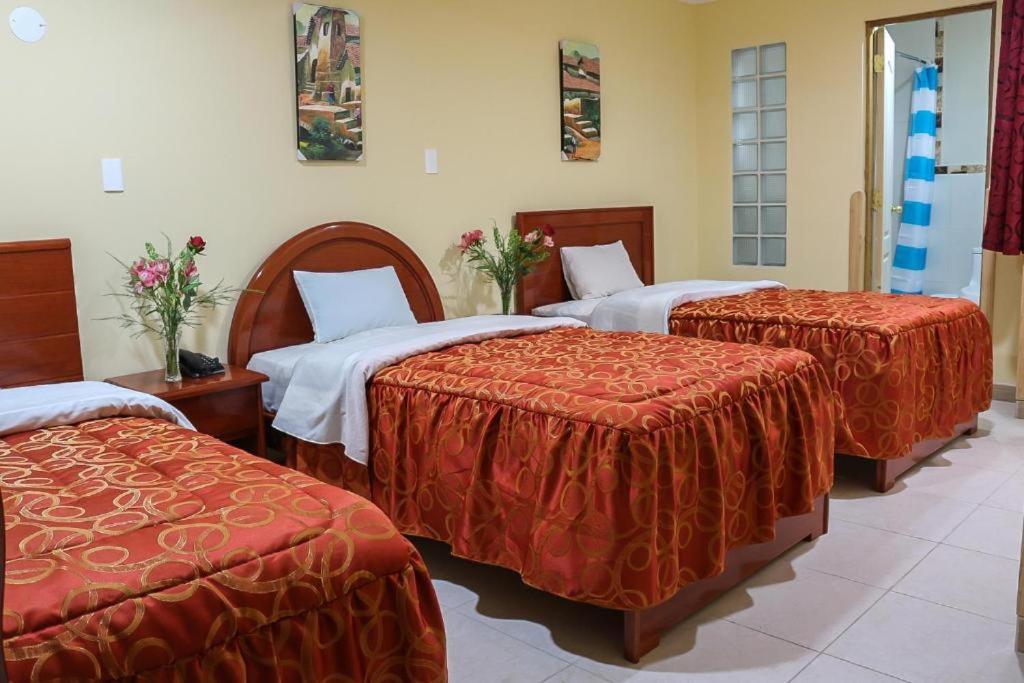 Postel nebo postele na pokoji v ubytování Hotel Elmer-Z