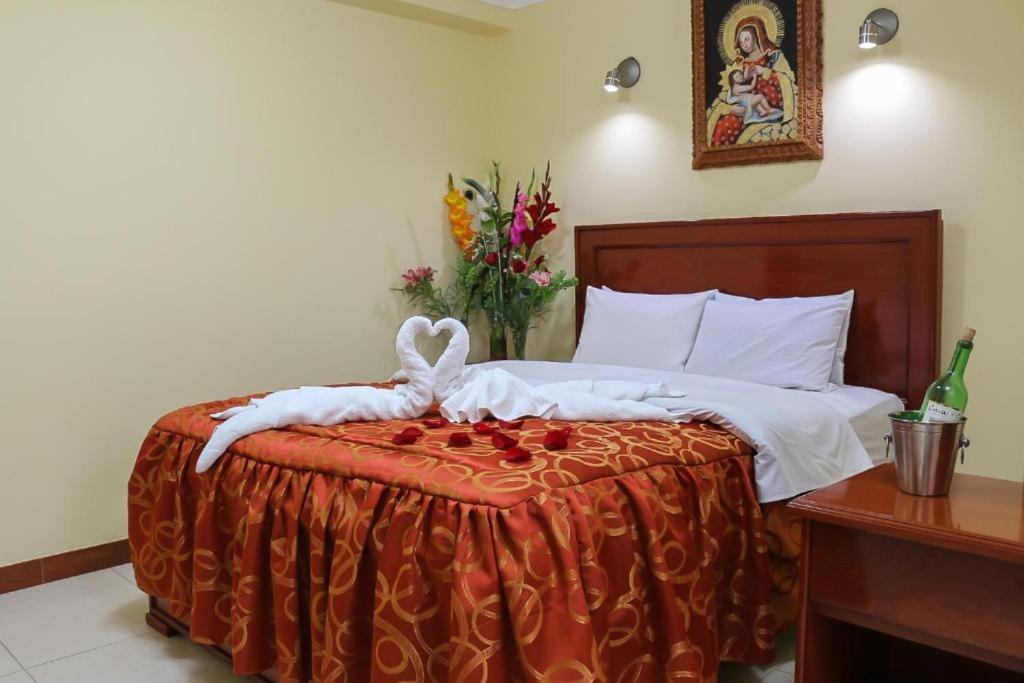 Postel nebo postele na pokoji v ubytování Hotel Elmer-Z
