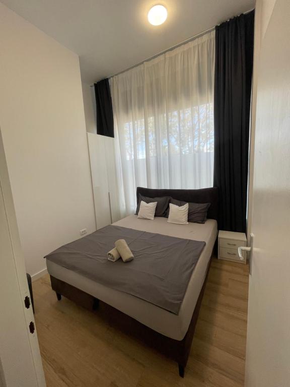 Posteľ alebo postele v izbe v ubytovaní Two bedroom apartment N Split