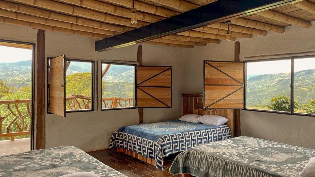 Katil atau katil-katil dalam bilik di Hotel Rancho Maju