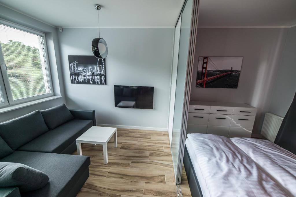 Postel nebo postele na pokoji v ubytování Silver One Apartments
