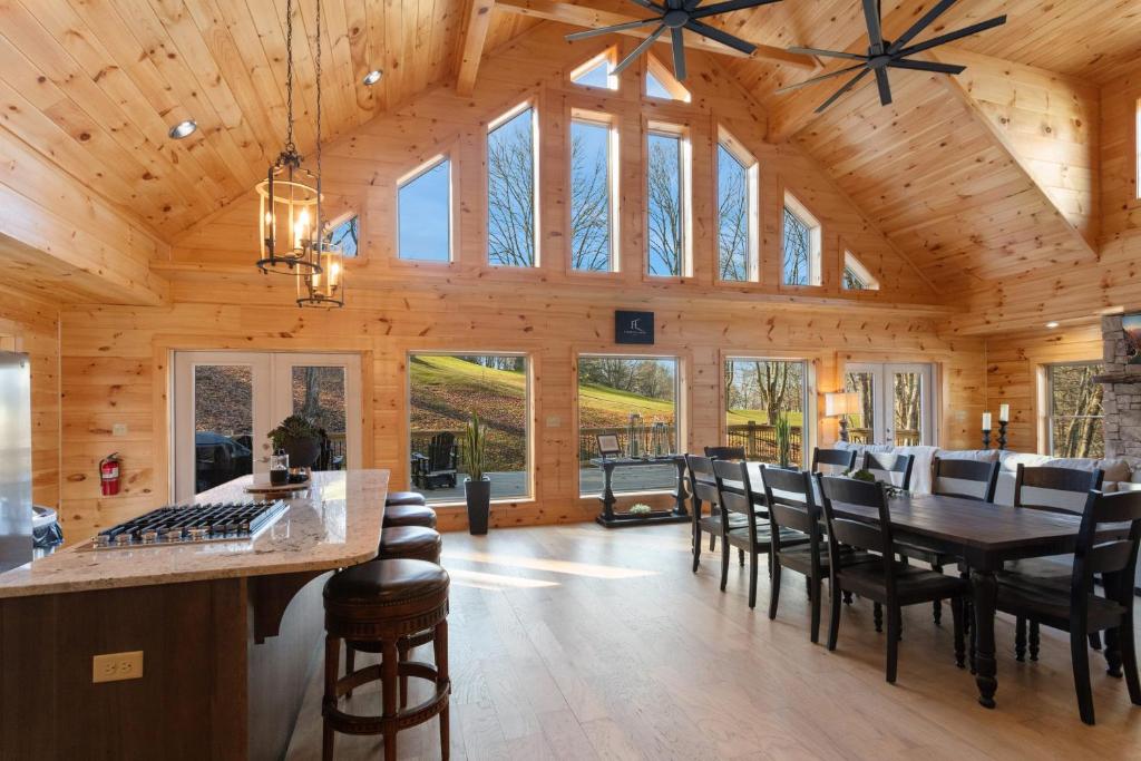 a large living room with a large wooden ceiling at Fairway Lodge On One in Beech Mountain