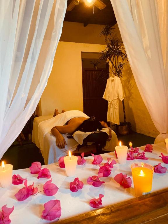 Voodi või voodid majutusasutuse Garden Hotel toas